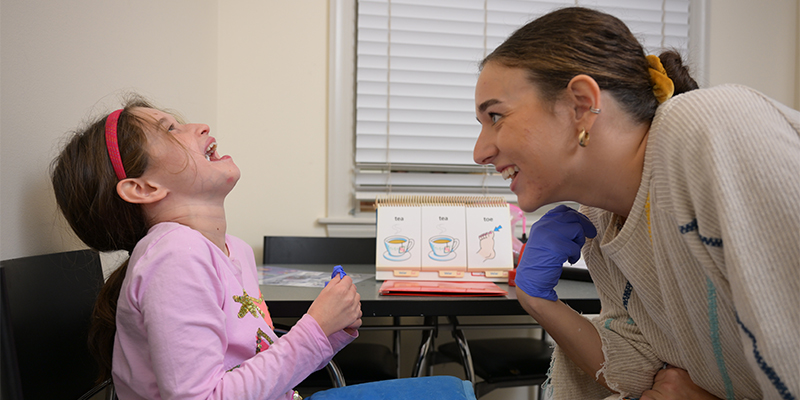 speech student working with pediatric patient
